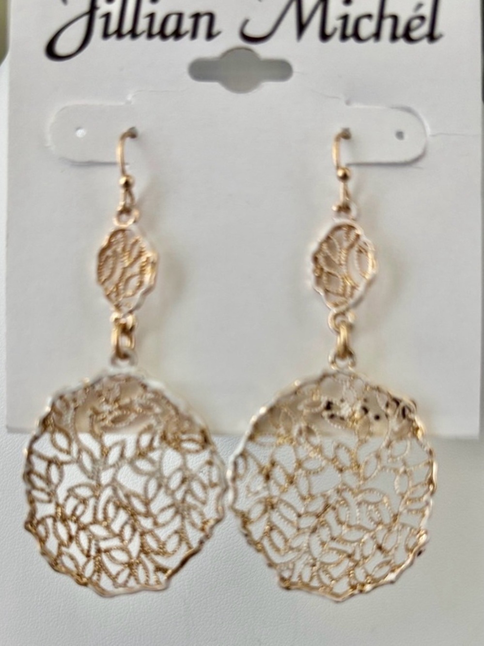 Jillian Michel Filigree leaf,cut out round dangle, white details,fishhook